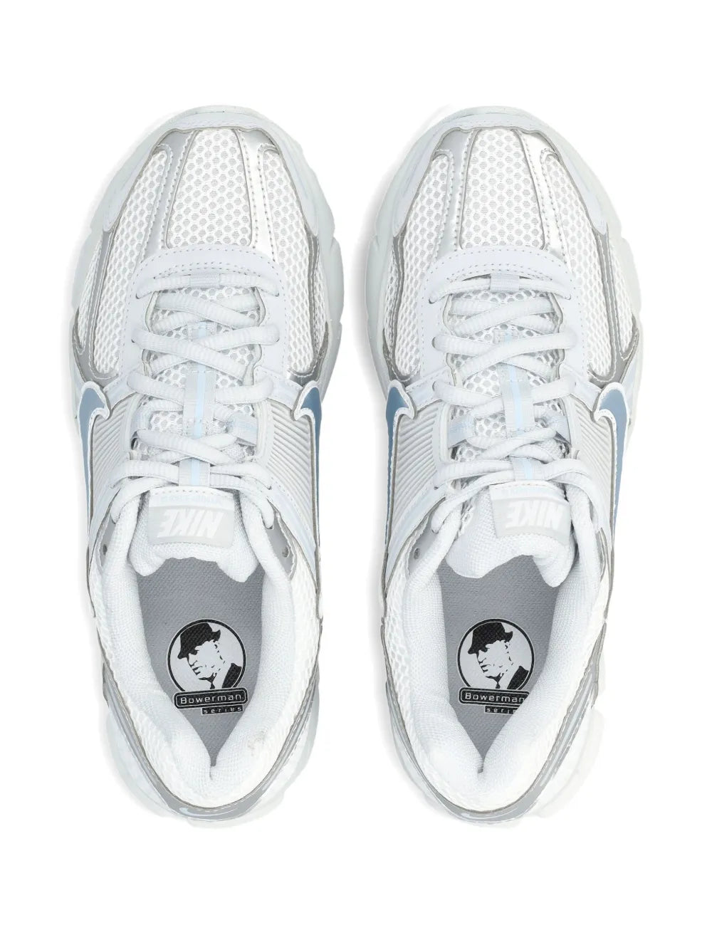 Nike Zoom Vomero 5 pair of white sneakers, front view, laces and tongue logo