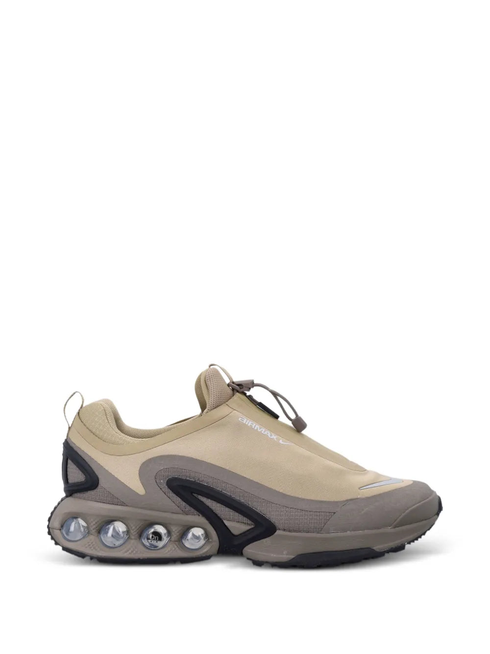 Beige Nike lace-up sneaker with chunky sole and visible air pods