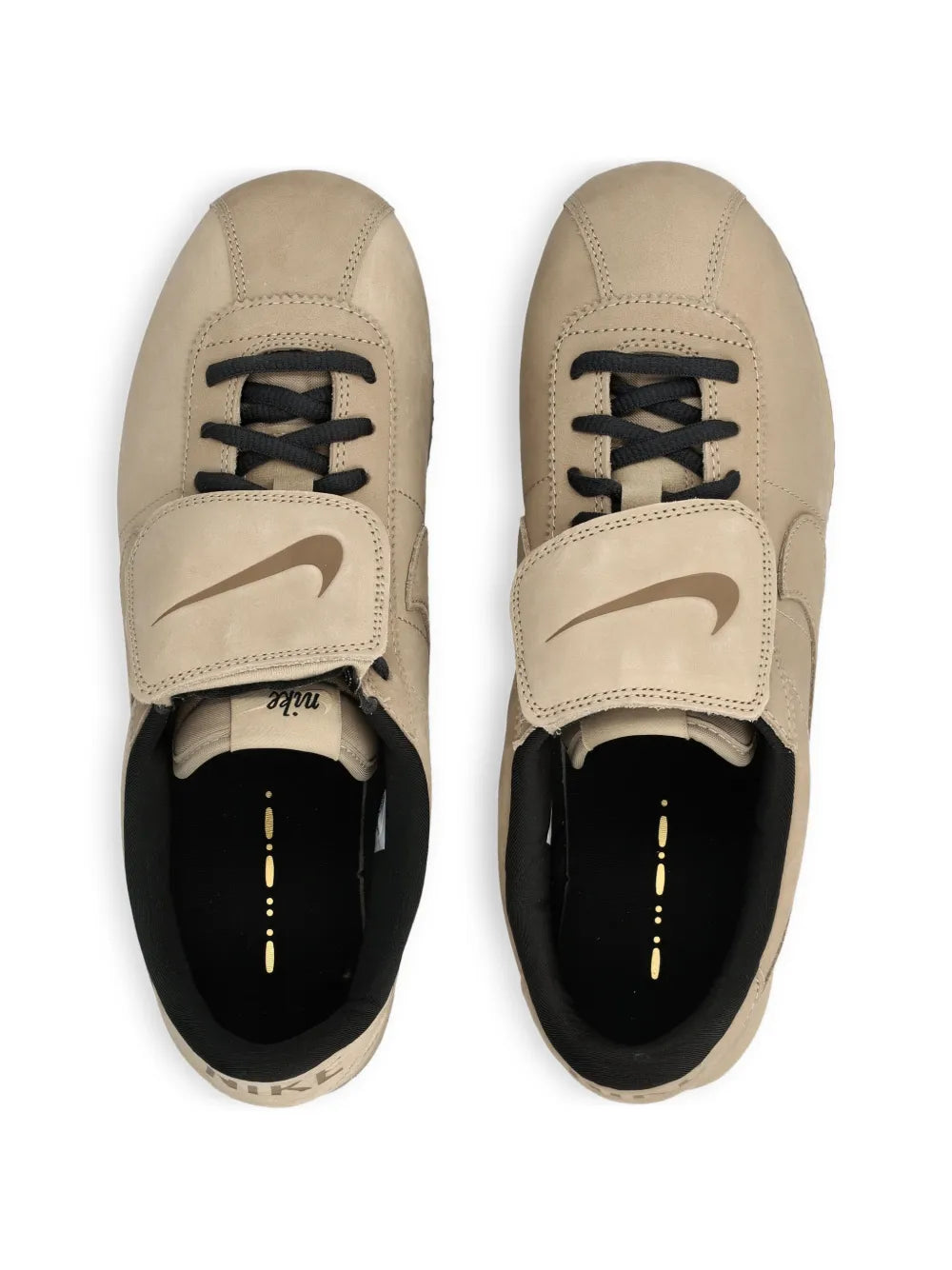 Nike beige leather Cortez sneaker front view, black tongue and laces