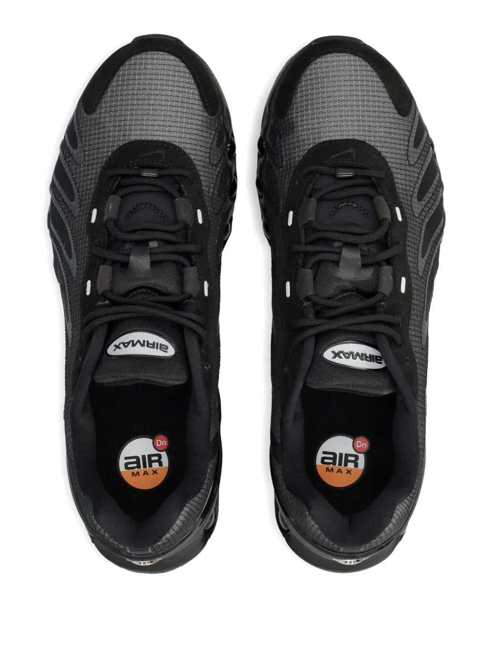 Nike trainers showing black lace-up uppers and Air Max logo on tongue