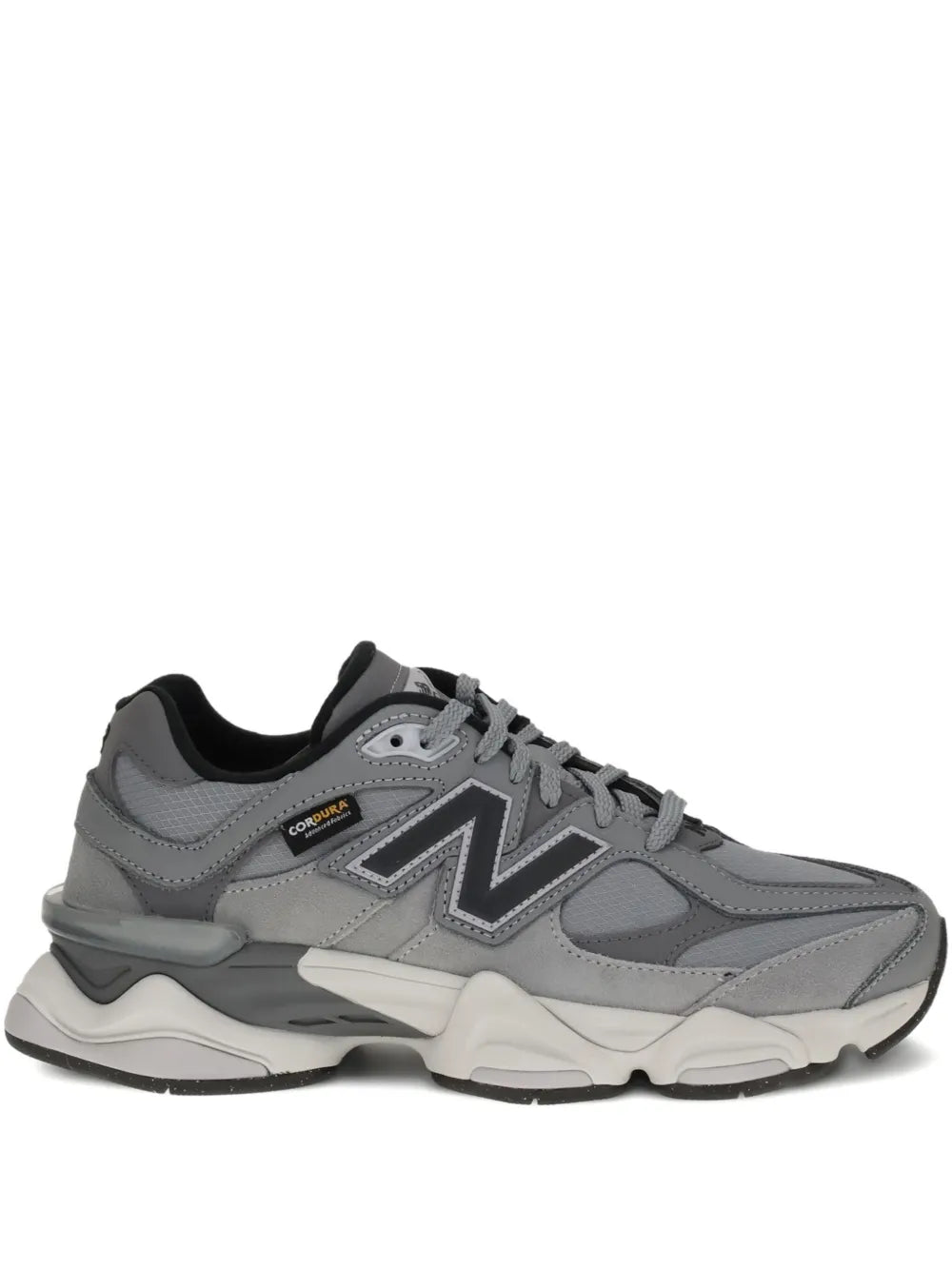 New Balance 9060 grey running sneaker with N logo and lace-up front
