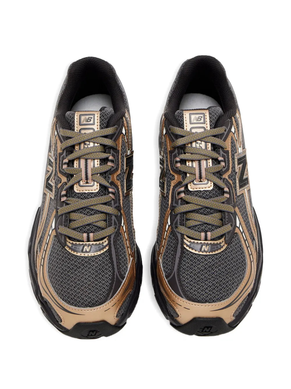 Pair of black and beige lace-up running shoes with N logo and patterned uppers