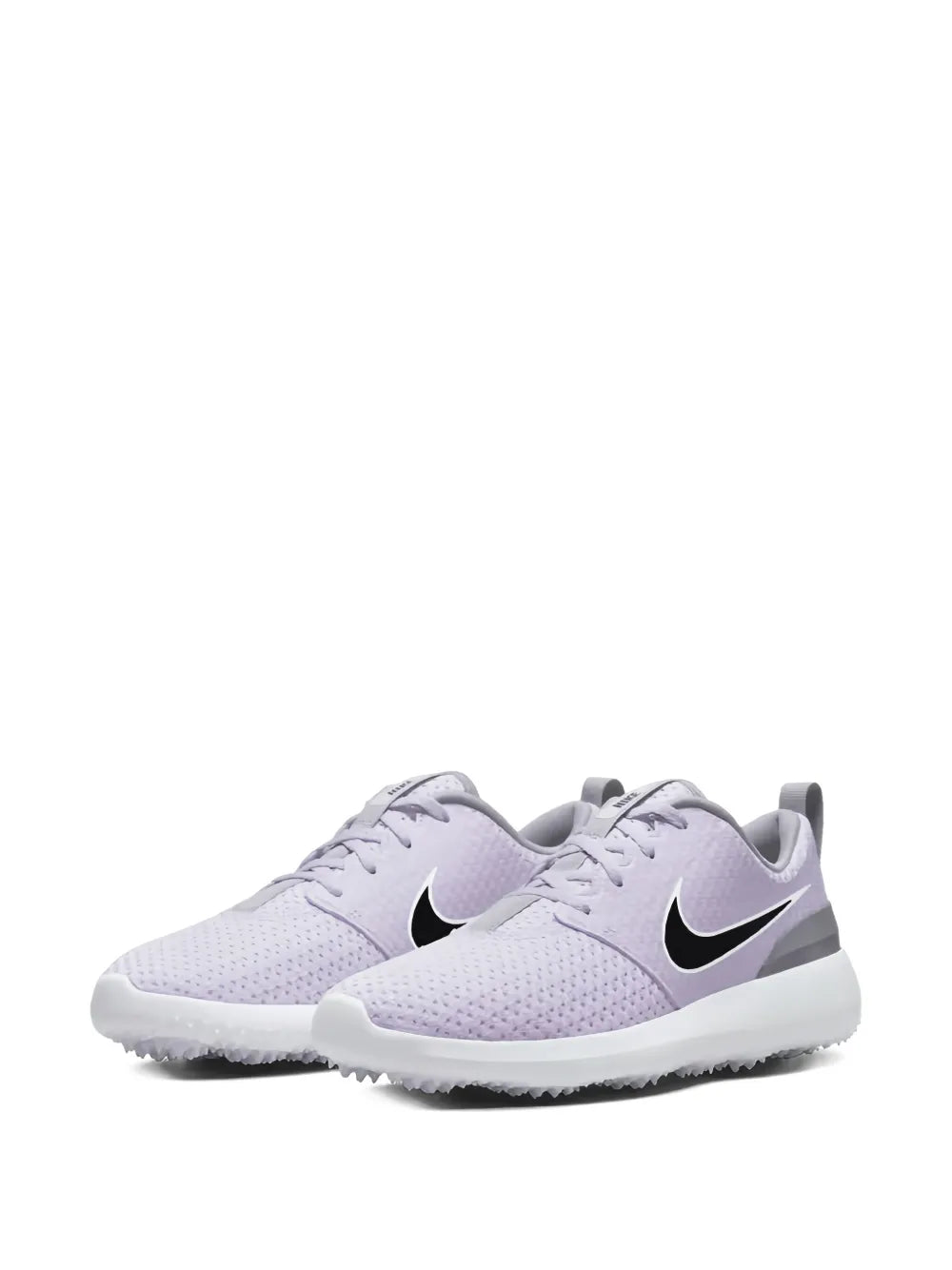 Pair of Nike Roshe Golf lace-up sneakers in light purple with black Swoosh