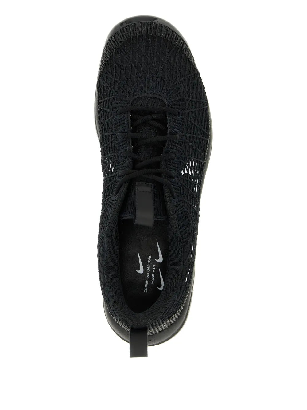 Black knit sneaker toe view with black laces and visible Swoosh on insole