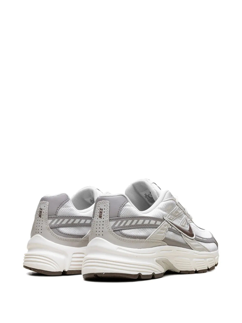Lace-up running sneakers heel and side view, white with gray panels