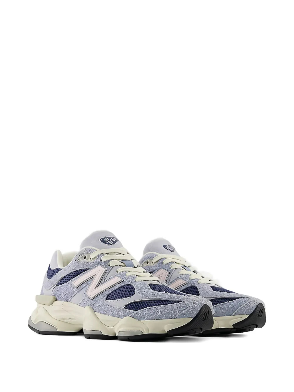 New Balance 9060 grey and navy lace-up sneakers with cream sole, side view