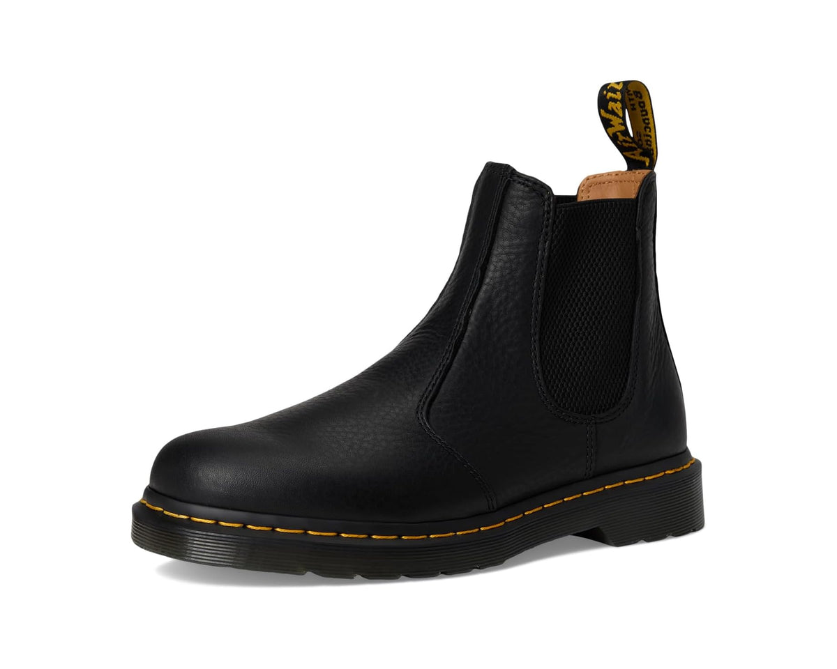 Unisex black leather Chelsea boot angled front view with elastic gore and yellow welt