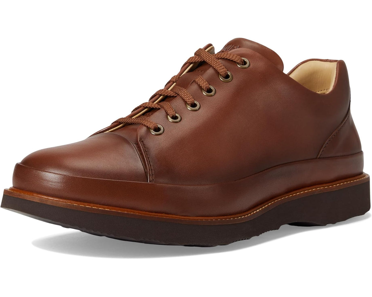Cognac leather lace-up dress shoe with brown laces and rubber sole
