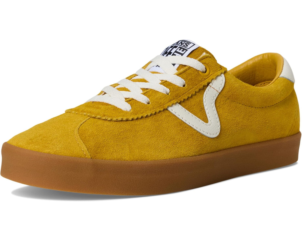 Mustard yellow suede low-top sneaker in 3/4 view, white laces and gum sole
