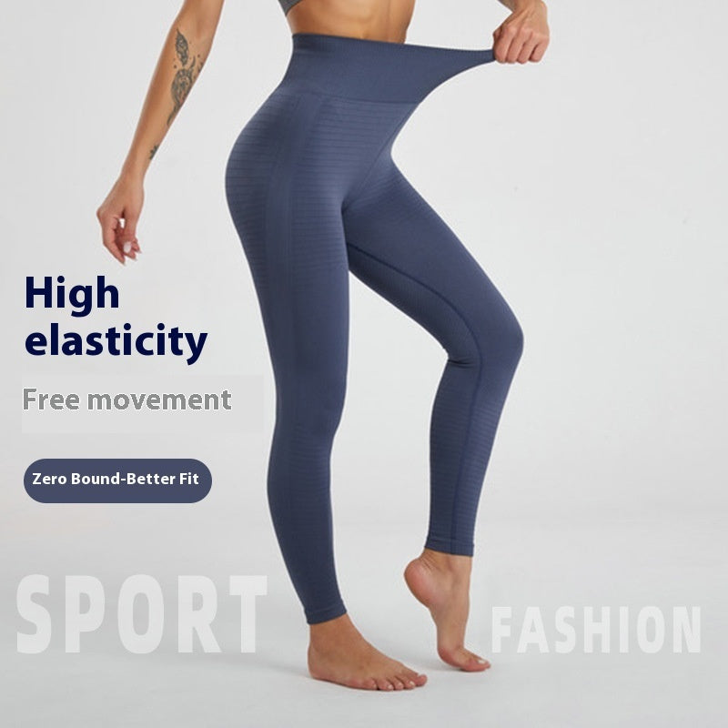 Women's fitness leggings, dark blue with ribbed texture and ankle-length fit