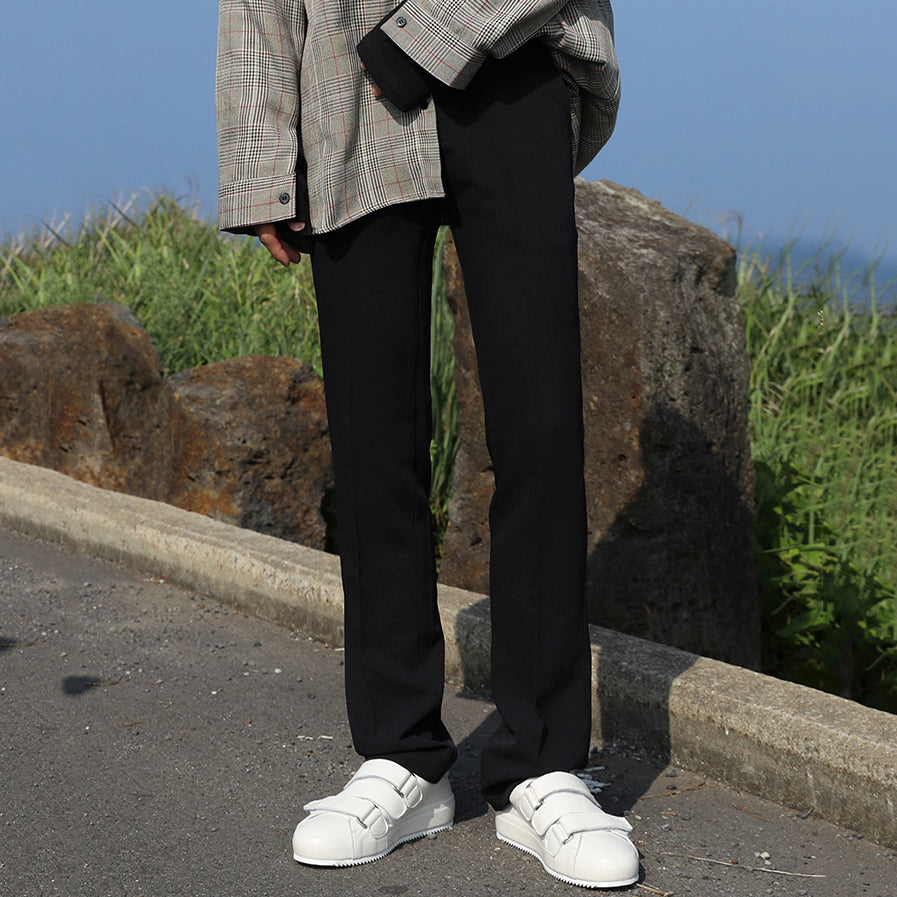 Loose straight trousers, black wide-leg style with side pockets