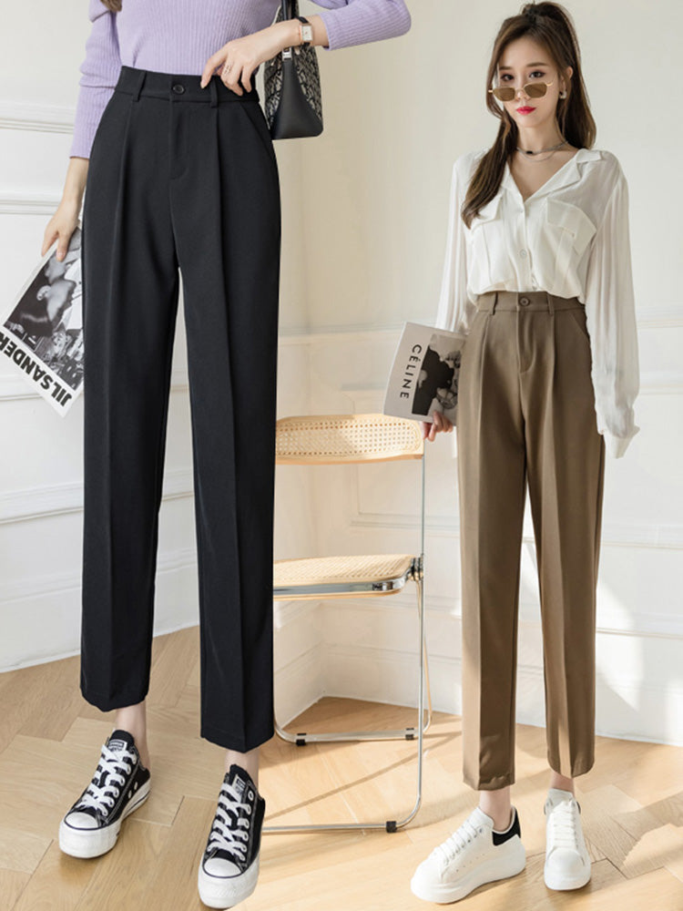 Black pleated wide-leg trousers with belt loops and button closure