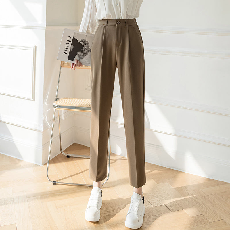 Olive-brown pipe pants with belt loops, pleats, and button closure