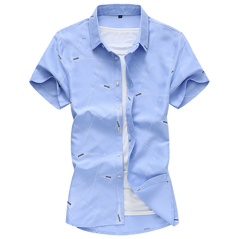 Light blue short-sleeve dress shirt with button front, pointed collar, geometric line print