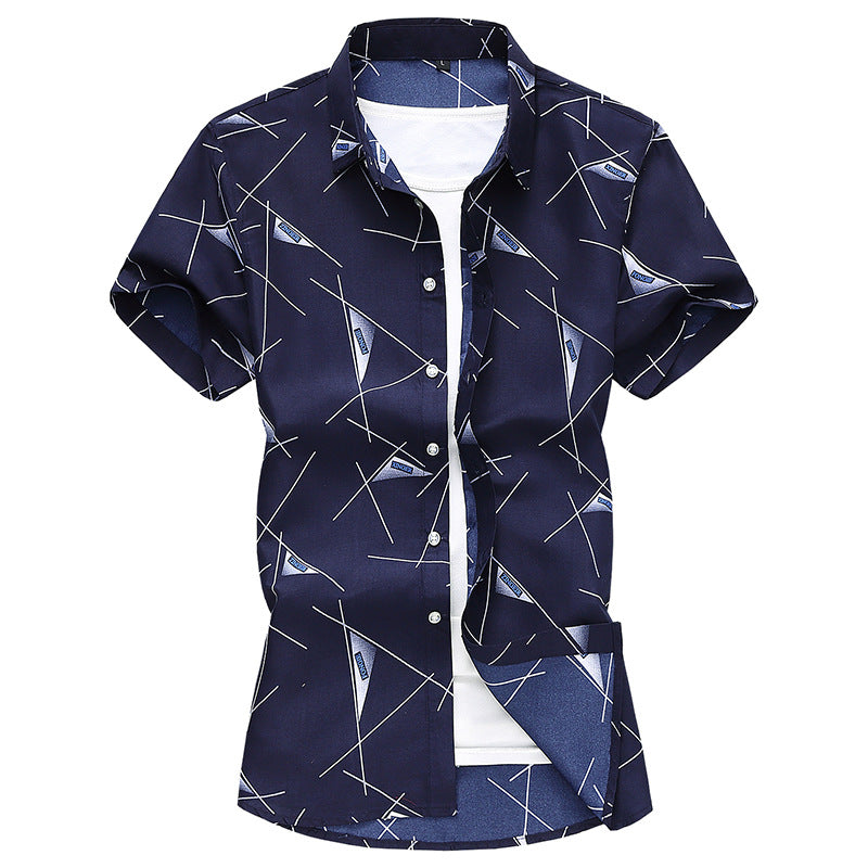 Navy short-sleeve dress shirt, button front, pointed collar, white abstract line pattern