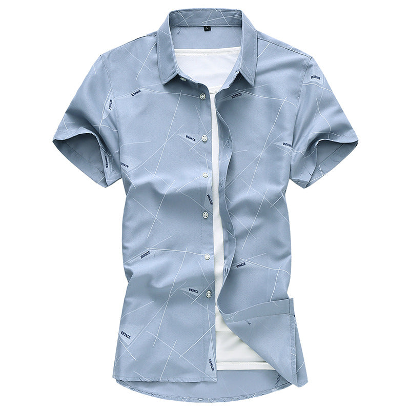 Light blue short-sleeve dress shirt, button front, pointed collar, fine line geometric print