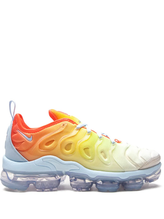 Nike Vapormax Plus sneakers with white, orange-to-yellow gradient upper and blue sole