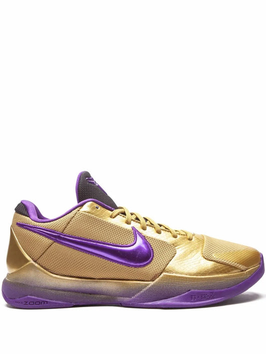 Purple and gold basketball sneaker with Nike swoosh and gold lace-up upper
