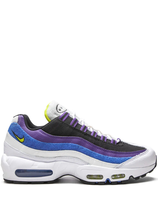 Nike Air Max 95 sneakers in black, purple, and blue with white sole and neon green accents