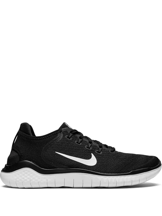 Nike Free RN 2018 black knit running shoe with white Swoosh and foam sole