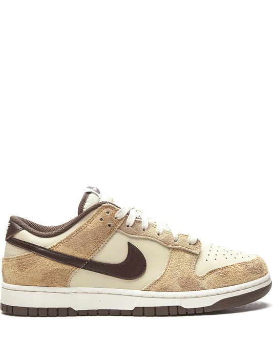 Nike Dunk Low PRM beige and white sneakers with dark brown Swoosh and laces