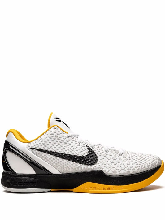 White and yellow men's basketball shoe with black midsole and swoosh