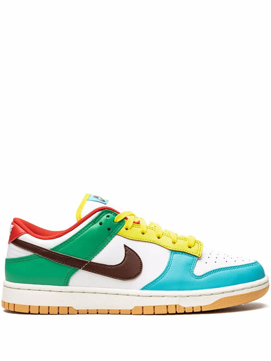 Nike Dunk Low low-top sneaker in white with green, turquoise, yellow laces, brown swoosh
