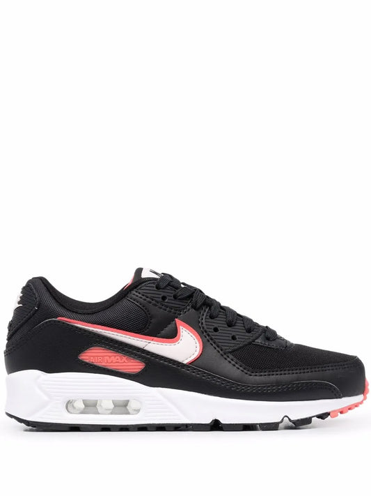 Black Nike Air Max 90 women's sneaker with red-and-white swoosh and visible Air unit
