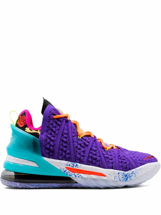Nike LeBron 18 high-top basketball shoe, purple knit upper with orange laces