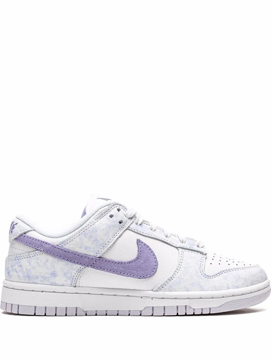 Nike low-top sneakers with white leather, light blue panels, and purple Swoosh