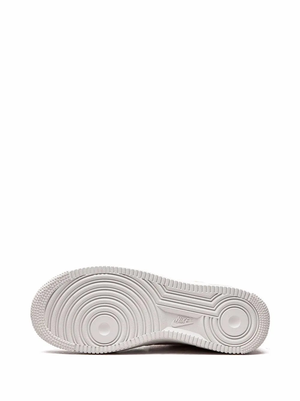 White rubber outsole with circular traction pattern