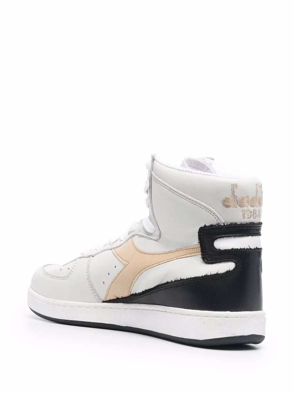 White high-top sneakers with beige toe panel, black heel guard, and lace-up front
