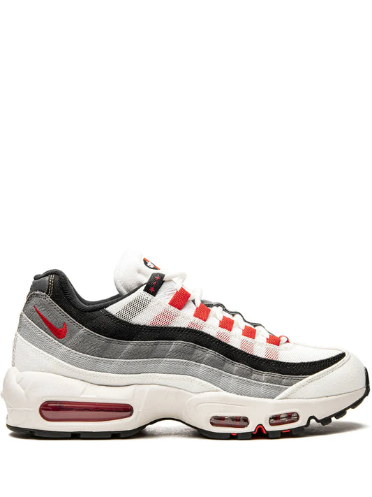 Nike Air Max 95 QS sneakers in white, gray, and black with red accents
