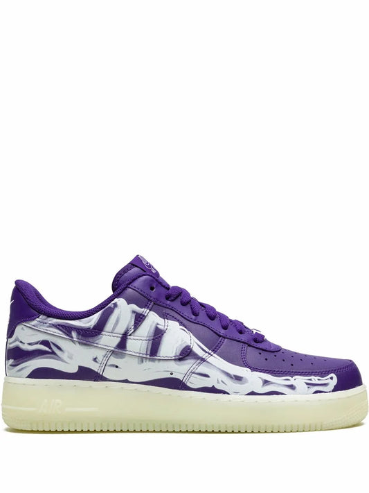 Nike purple low-top sneaker with white Swoosh and patterned side panel