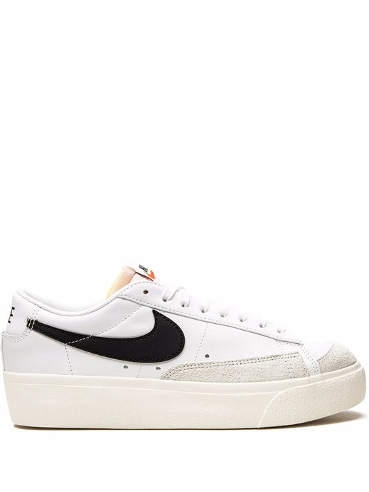Nike platform low-top sneakers, white with black swoosh, lace-up