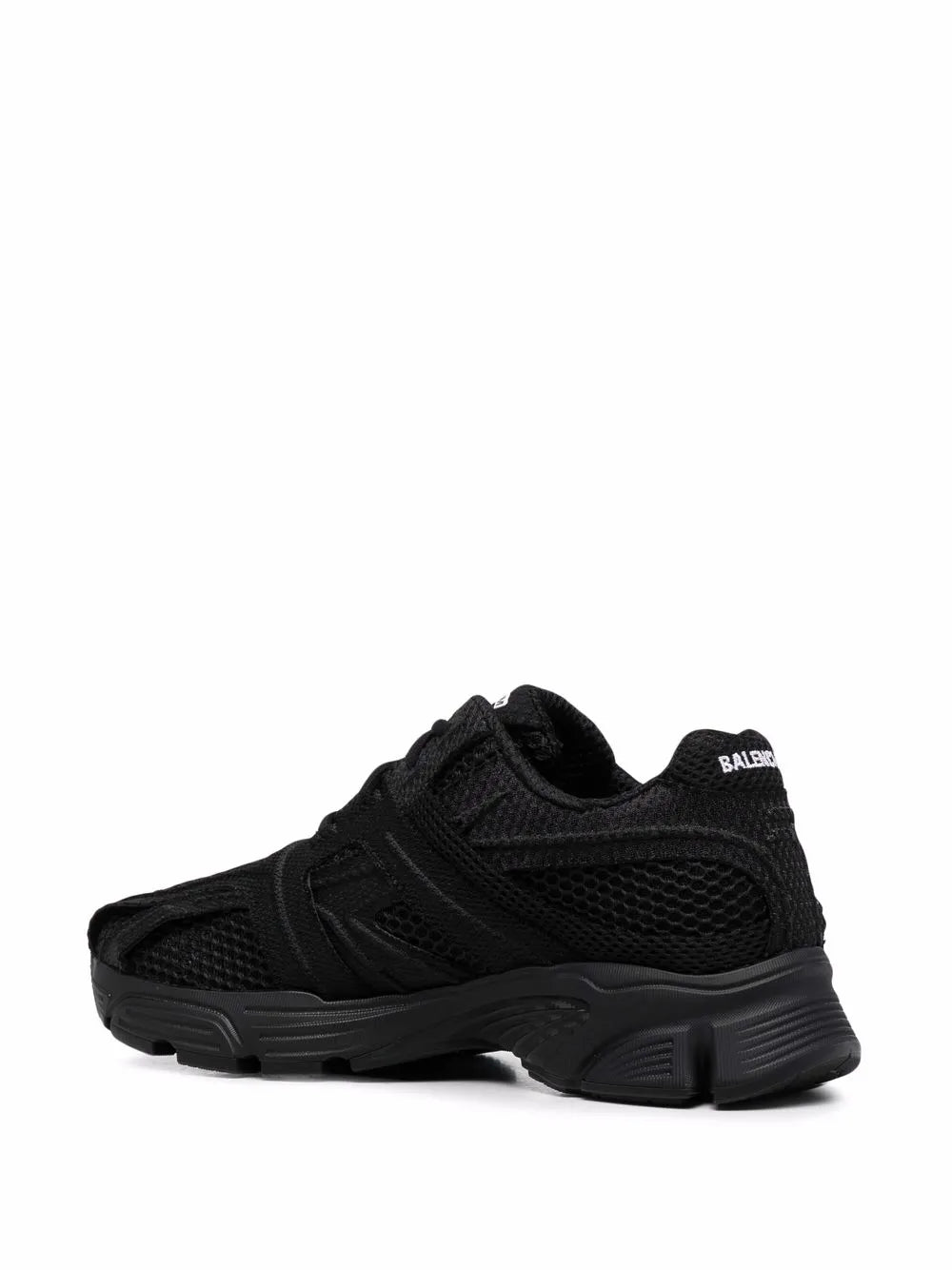 Black low-top lace-up sneaker side view with textured panels and molded sole