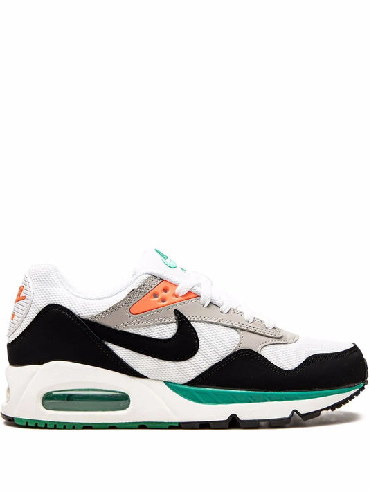 Black, white and orange Air Max sneakers with green Air cushioning and swoosh logo