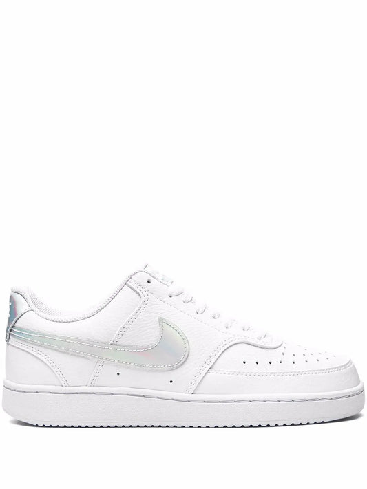 Low-top white sneakers with Nike swoosh and lace-up front, side view