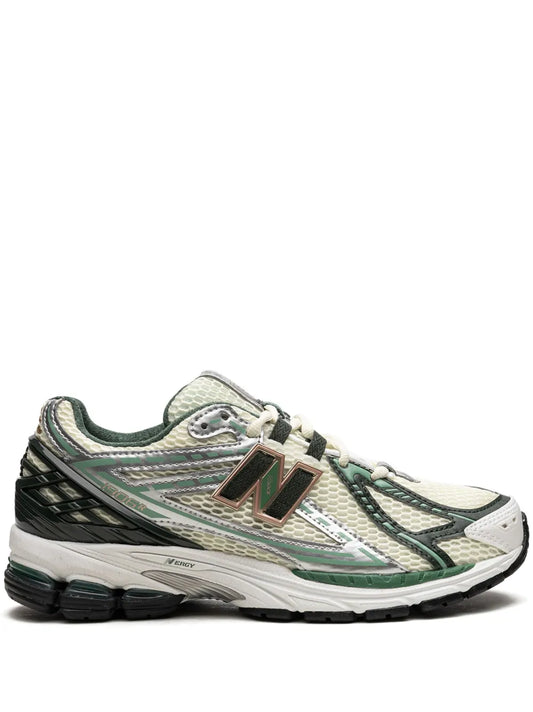 New Balance 1906R running sneaker, white with green trim and black accents