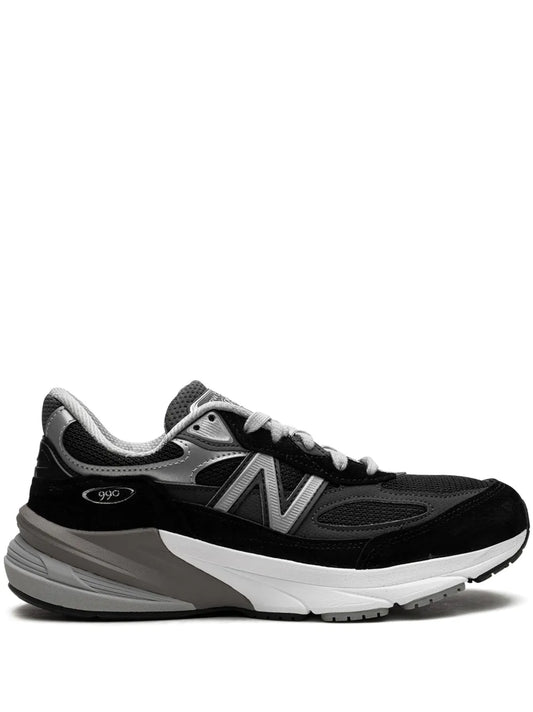 New Balance 990V6 running shoe in black with gray and white accents, lace-up.