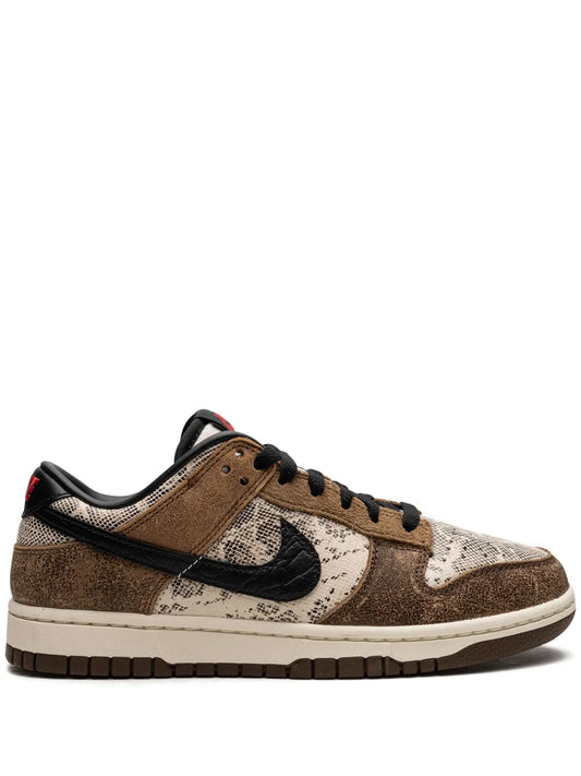 Low-top Nike Dunk sneakers in brown and beige with black Swoosh and lace-up design
