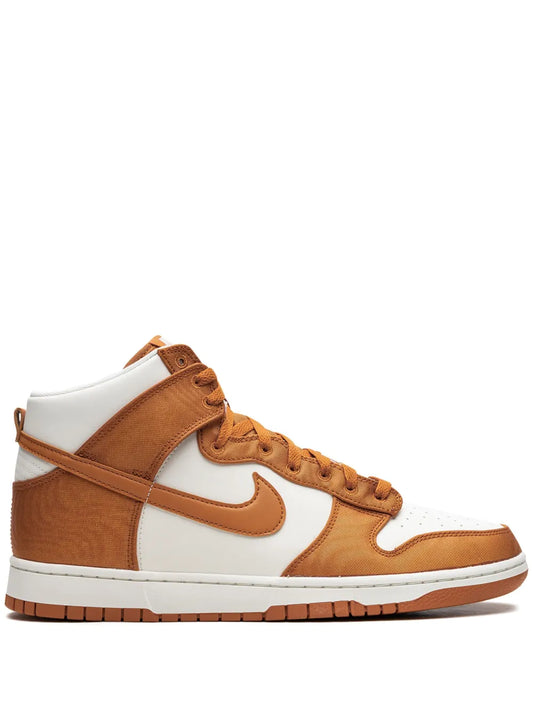 Nike Dunk high-top sneaker with brown leather panels, white overlays, and tan laces