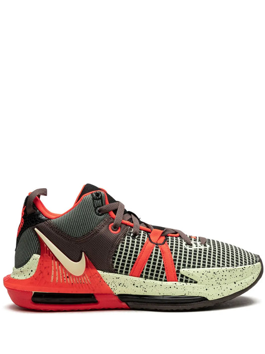Black, red and cream low-top basketball sneaker with Nike swoosh and lace-up closure