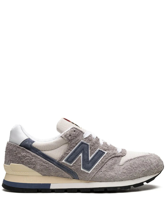 New Balance 996 sneakers, grey suede with navy N logo, white laces, tan midsole