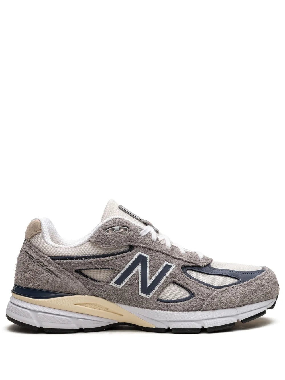 Grey New Balance 990V4 running shoes, side view with N logo