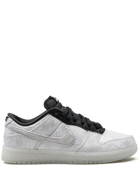 Nike Dunk Low low-top sneakers with light gray patterned uppers and black accents