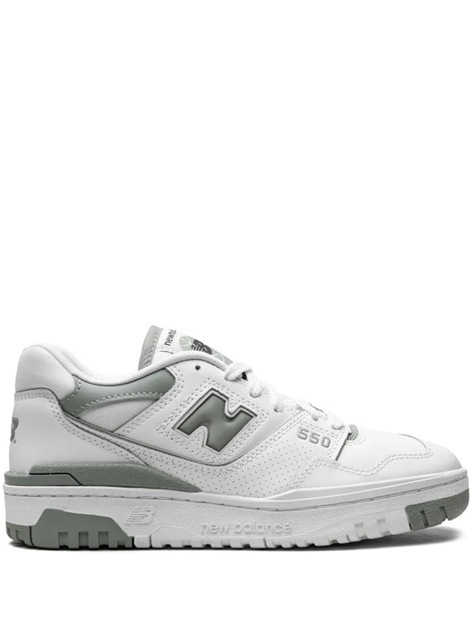 New Balance 550 sneakers, white leather with green accents and thick rubber sole
