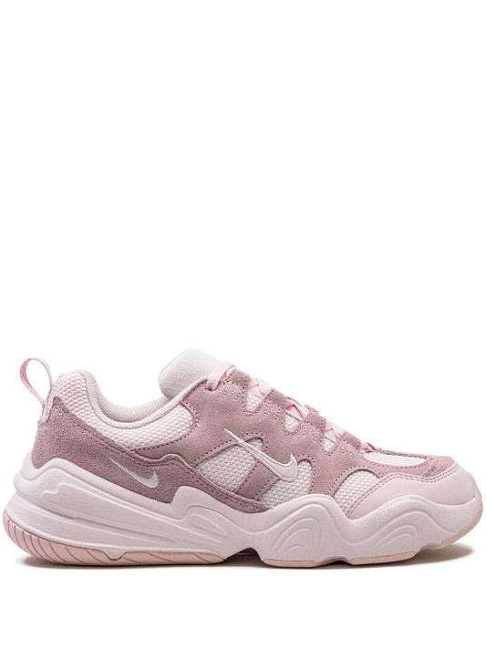 Pink and mauve Nike lace-up sneakers with chunky wavy sole and swoosh logo