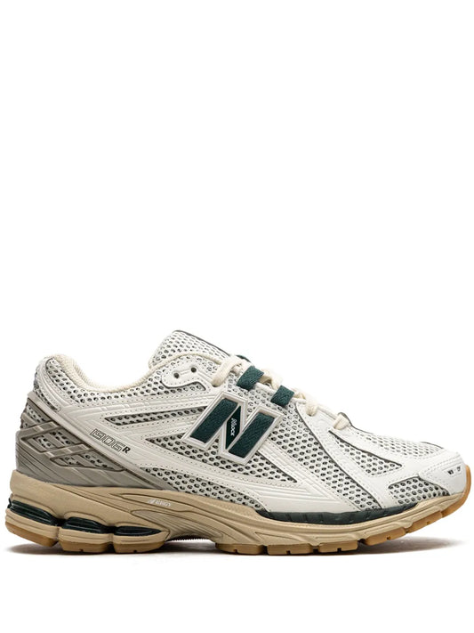 New Balance 1906R white mesh runner with green N logo and tan rubber sole
