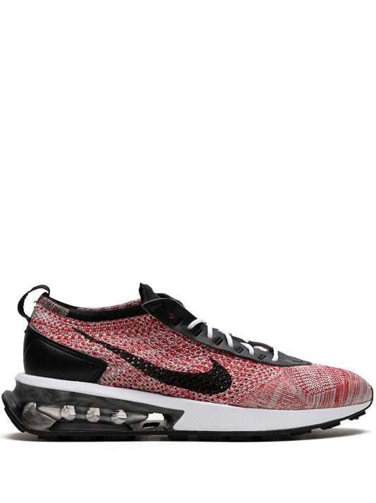 Lace-up running sneaker with red-and-black knit upper, Nike swoosh, Air Max sole